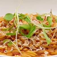 Orzo · Large rice shaped pasta tossed with fresh tomato sauce and grated kefalotyri cheese.