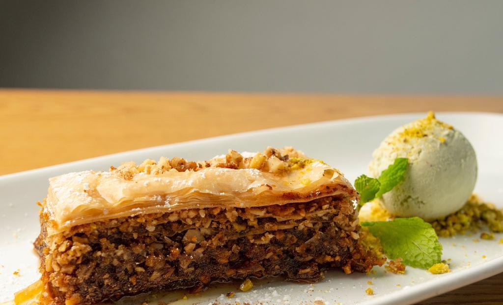 Baklava · Layered  pastry dessert made of phyllo pastry filled with chopped walnuts, almonds and pistachio nuts, citrus syrup