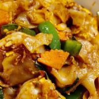 Kee Mao (Drunken Noodle) · Spicy. .Flat noodles with egg, onions, bell peppers, basil and carrots with chili basil sauce.