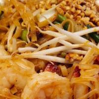 Pad Thai  (Gluten Free) · Famous thai rice noodle with egg, dried bean curd, scallion and bean sprouts ground peanuts.