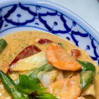 Panang Curry (Gluten Free) · Spicy. Bell peppers, carrots ,onions ,string beans, coconut milk.
