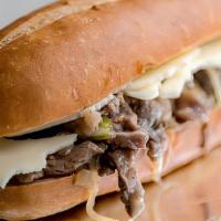 Philly Cheese Steak Sandwich · Philly steak, mozzarella cheese, bell peppers and sautéed onions.