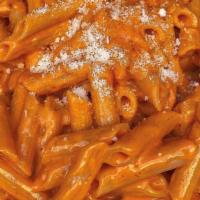 Penne Alla Vodka · Penne pasta in a creamy tomato sauce and a touch of vodka.