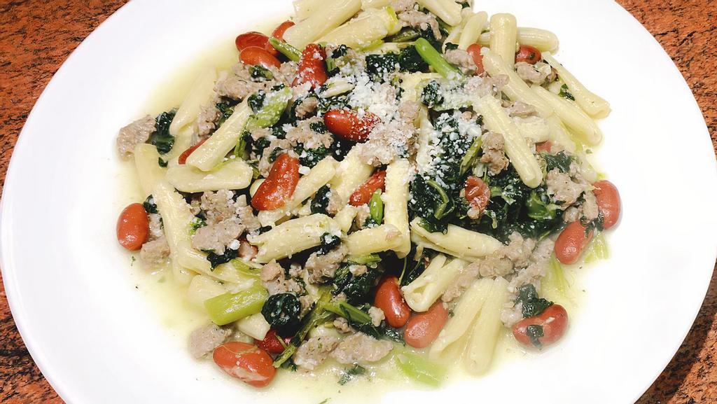 Cavateli Broccoli Rabe · Cavatelli pasta with broccoli rabe, cannelloni beans, sausage, garlic and olive oil.