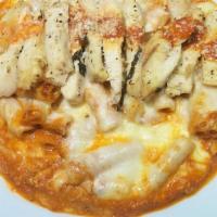 Baked Ziti With Grilled Chicken · Grilled chicken, ziti pasta mixed with ricotta and fresh tomato sauce topped with melted moz...