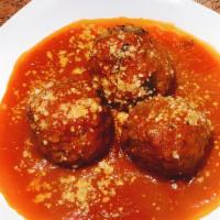 Meatballs (3) · Served with tomato sauce.
