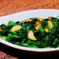 Side Sautéed Spinach · Sauteed in extra virgin olive oil and garlic.