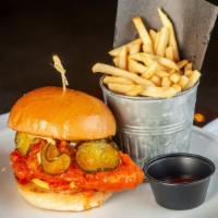 Hot Chicken Sandwich · Crispy thighs, house hot sauce, homemade jalapeño/cucumber B&B pickles, with spicy aioli