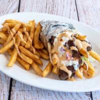 Greek Fire · Toasted Fresh Pita stuffed with Gyro Meat , French Fries,Tomato and Onion with Tzatziki & ou...