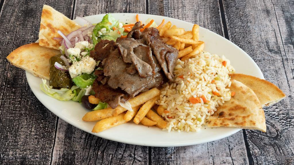 Greek Festival · Gyro Meat over Greek Salad  with Pita Wedges, Rice, Fries & Tzatziki