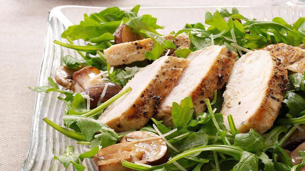 Arugula Salad With Chicken · Served with goat cheese, cranberries, caramelized walnuts and vinaigrette dressing.