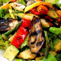 Grilled Vegetable Salad · Assorted greens topped with grilled portobello mushrooms, zucchini, yellow squash, roasted r...