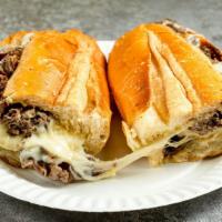 Roast Beef Melt Sandwich · Roast beef with melted Swiss cheese served on toasted garlic bread.