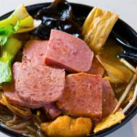 Ham Hot Pot 午餐肉麻辣烫 · Served with winter melon, potato, cabbage, bok choy, lotus root, seaweed, wood ear, fried to...