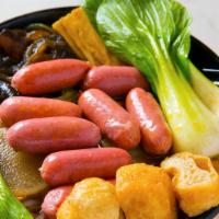 Mini Sausage Hot Pot 鑫鑫肠麻辣烫 · Served with winter melon, potato, cabbage, bok choy, lotus root, seaweed, wood ear, fried to...