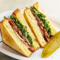 Blt Sandwich · Your choice of beef or turkey bacon, lettuce, house made herb mayo, and tomato served with a...