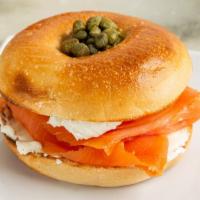 Smoked Salmon Bagel · Cream cheese on your choice of bagel, 3 oz smoked salmon with purple onion, capers, tomato.