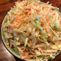  Kani Salad · (Spicy or Unspicy) Crab salad on top of house green.