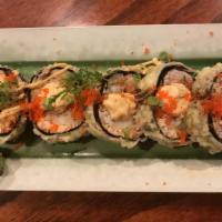 Yankee Roll · Inside is tuna, salmon, yellow tail, eel. Outside, spicy mayo, tobiko, scallion (deep fried).