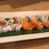 Tokyo Roll (5 Pc) · Big roll, inside is tuna, yellowtail, salmon, avocado. Outside, tobiko.