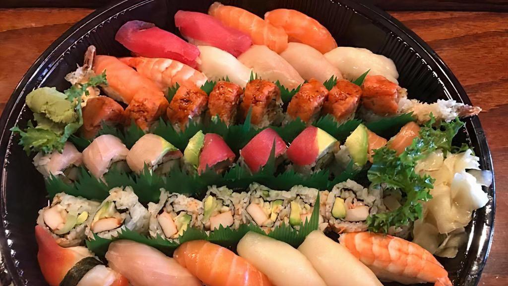 Sushi (For 2) · 20 pcs sushi, 1 California roll, 1 rainbow roll & 1 New York roll.