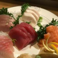 Sashimi Deluxe · 18 pcs of assorted raw fish.