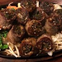 Beef Negimaki Dinner · Beef rolled around scallion, glazed with teriyaki sauce.