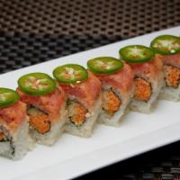 Dynamite Roll · Kani salad topped with spicy tuna, yellowtail and jalapenos.