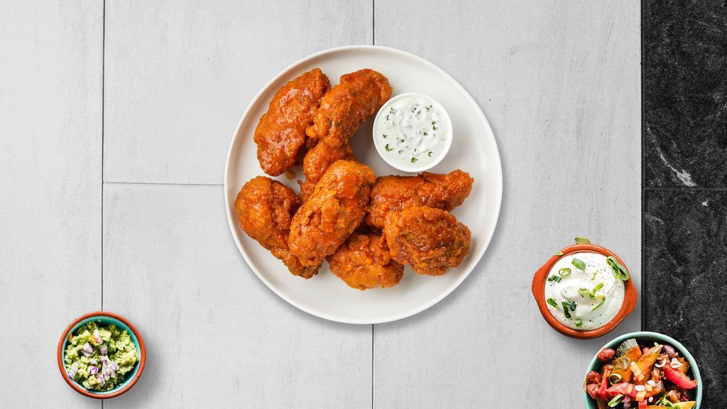 Girls Just Wanna Habanero Mango Wings · Fresh chicken wings breaded, fried until golden brown, and tossed in mango habanero sauce. Served with a side of ranch or bleu cheese.