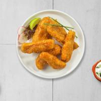 Buffalo Springfield Tenders · Chicken tenders breaded and fried until golden brown before being tossed in buffalo sauce.