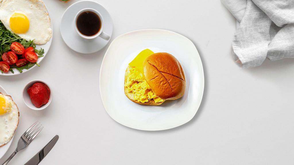 Cheesy Egg Breakfast Sandwich · Scrambled egg and cheese on your choice of bread.