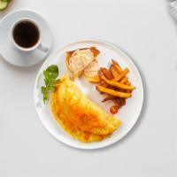 Cheese Omelette · Eggs cooked with your choice of two cheeses as an omelette. Served with toast and home fries.