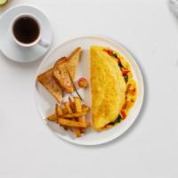 Very Veggie Omelette · Eggs cooked with tomatoes, onions, mushrooms, peppers, and broccoli.  Served with toast and ...