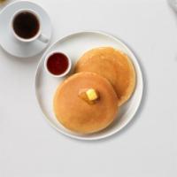 Classic Pancakes · Fluffy pancakes cooked with care and love served with butter and maple syrup. Served in pairs.