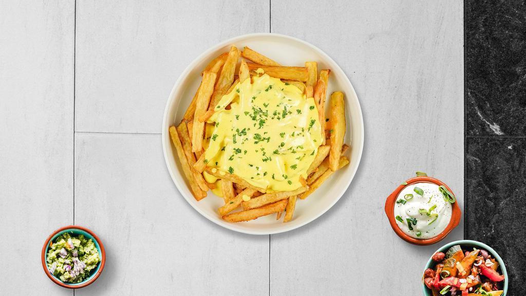 Cheese Fries · Idaho potato fries cooked until golden brown and garnished with salt and melted cheddar cheese.