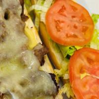 Steak And Chesse Sandwich · CARNITAS DE RES CEBOLLA QUESO LECHUGA TOMATE MAYONESA KETCHUP