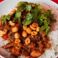 Spicy Kung Pao Chicken Bowl · Tender chicken that is cooked in a sweet and spicy sichuan chili-soy sauce, served on jasmin...