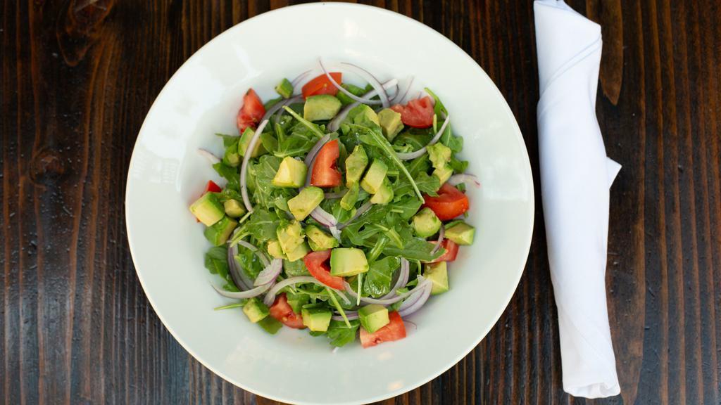 Avocado Salad · Baby arugula, avocado, roma tomatoes, red onions, citrus vinaigrette dressing.