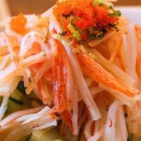 Spicy Kani Salad · Crab stick (contains gluten), cucumber, masago (contains gluten), and tempura flakes (contai...