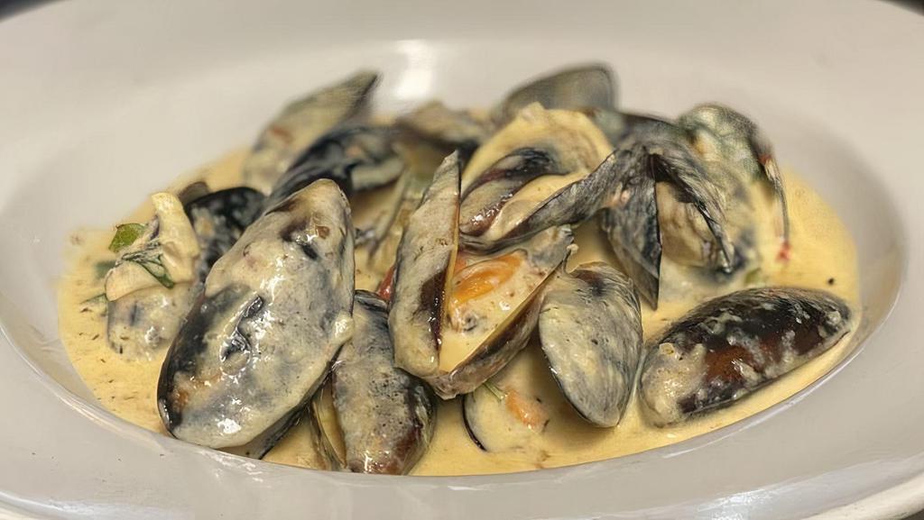Steamed Mussels · Sauteed in Garlic Tomato Sauce