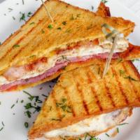 Egg & Cheese Panini · Fresh eggs an cheese stuffed in between homemade bread grilled on a panini press.