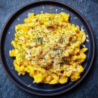 Truffle Mac ＆ Cheese · Macaroni prepared with freshly made cheese sauce, beurre noisette, bread crumbs and white tr...