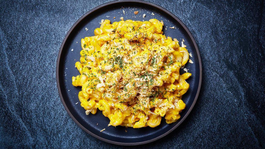 Truffle Mac ＆ Cheese · Macaroni prepared with freshly made cheese sauce, beurre noisette, bread crumbs and white truffle.