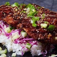 Chicken Katsu Bowl · Lightly fried chicken cutlet with panko breadcrumbs over choice of base and salad with house...
