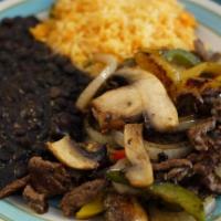 Fajitas · Your choice of meat sauteed with mix bell peppers, mushrooms and onions. Served with rice an...