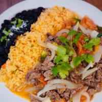 Bistec A La Mexicana · Beef saute with tomatoes, jalapenos and onions. Served with rice and beans.