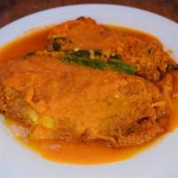 Chiles Rellenos · Stuffed poblano peppers with queso Oaxaca and topped with a tomato sauce 
rice and beans and...