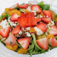 Strawberry Mandarin Salad · Strawberry, feta cheese, walnuts, Mandarin orange, & mixed greens with raspberry vinaigrette.
