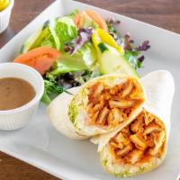 Buffalo Chicken Wrap · With blue cheese dressing, lettuce, & tomato. All wraps comes with side salad.