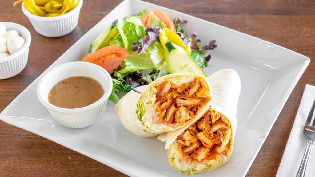 Buffalo Chicken Wrap · With blue cheese dressing, lettuce, & tomato. All wraps comes with side salad.